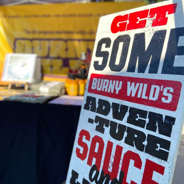 Signage | Burny Wild's Adventure Sauce at the Raleigh Night Market in Downtown Raleigh, NC